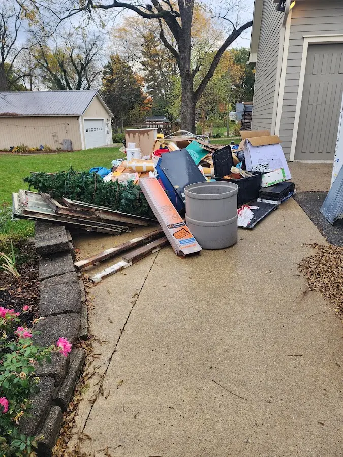Dumpster being loaded with debris for Residential Dumpster Rental in Fetters Hot Springs-Agua Caliente